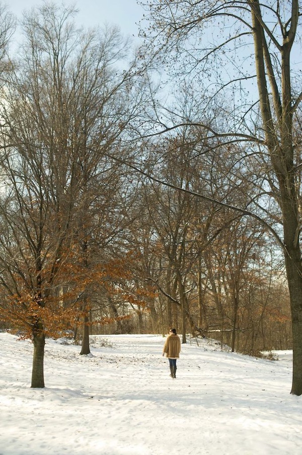 wearing a fur coat